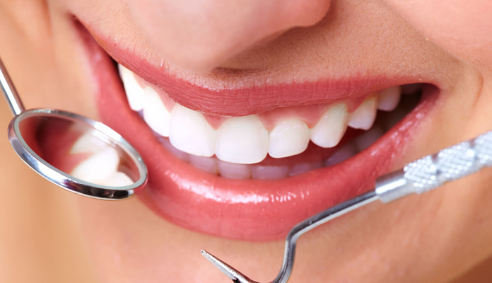 treat dark spots near gums