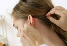 what causes lumps or cysts behind ears