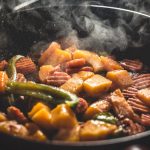 vegetable food cooked on frying pan