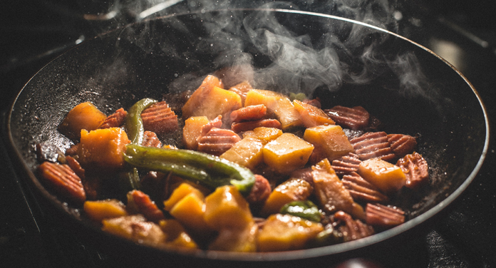 vegetable food cooked on frying pan