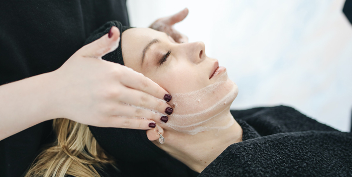 exfoliation gently rubbing surface of the skin